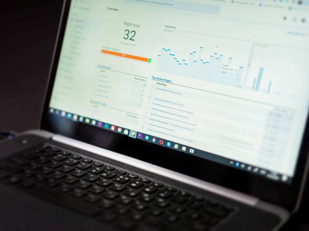 Laptop showing an ad results dashboard